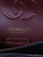 Chanel Small Black Lambskin Classic Flap.