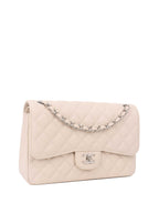 Chanel Jumbo Ivory Caviar Classic Flap.