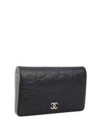 Chanel Black Camellia Wallet.
