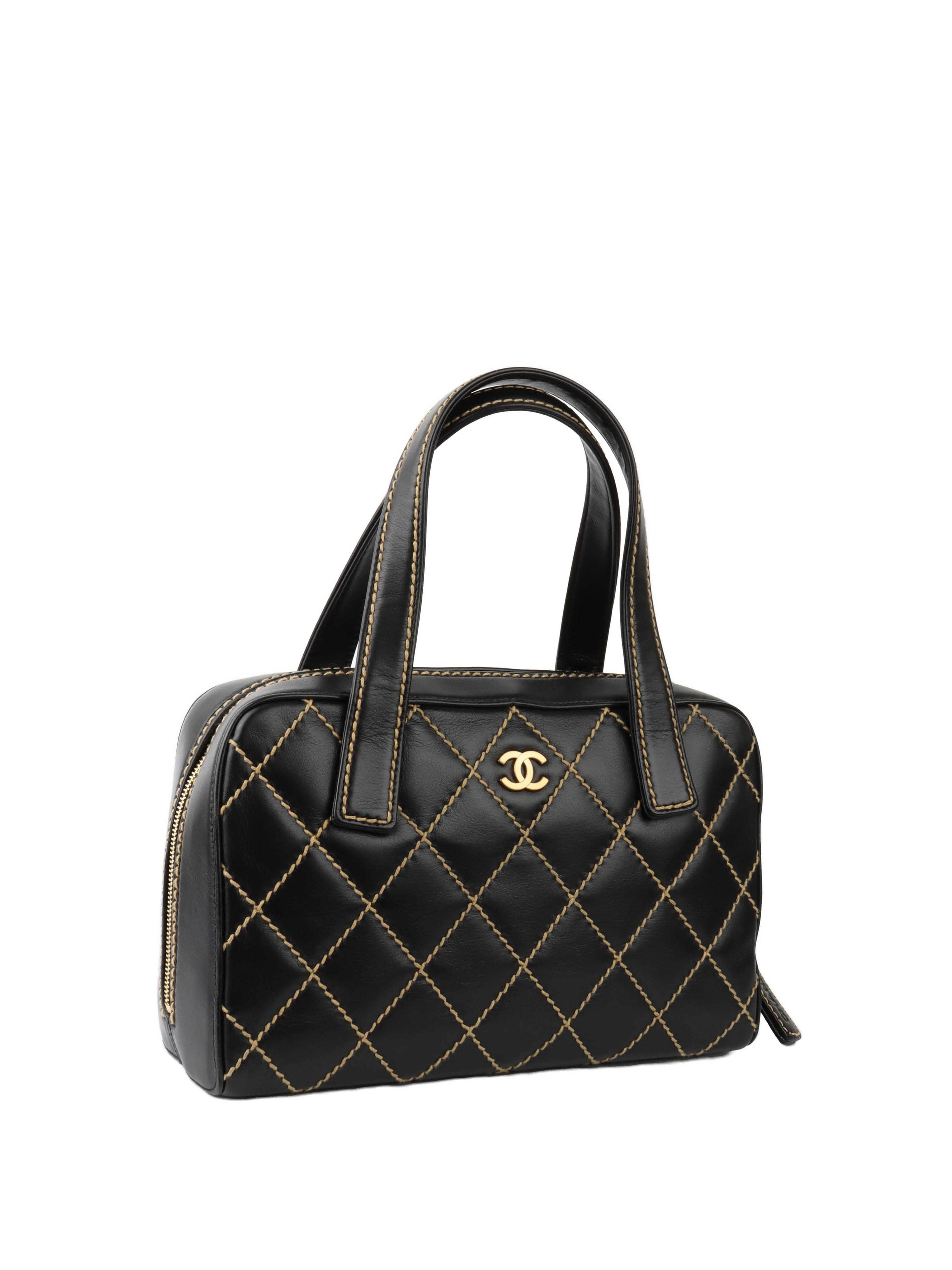 Chanel Black with Gold Trim Bowling Bag.