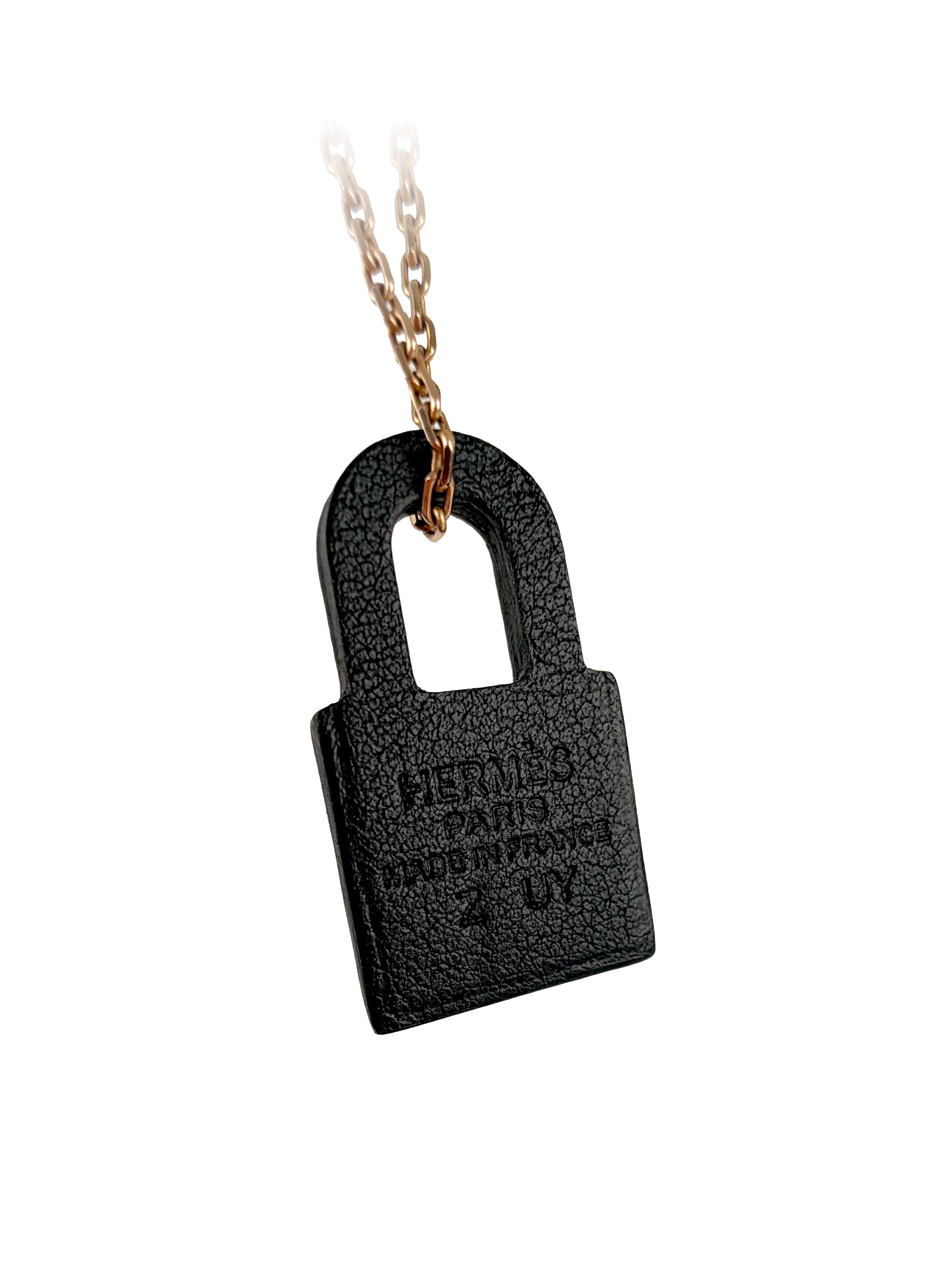 Hermes Black & Gold O'Kelly Pendant.