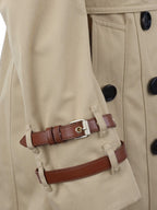 Burberry Tan Trench Coat with Leather Sleeve Straps.