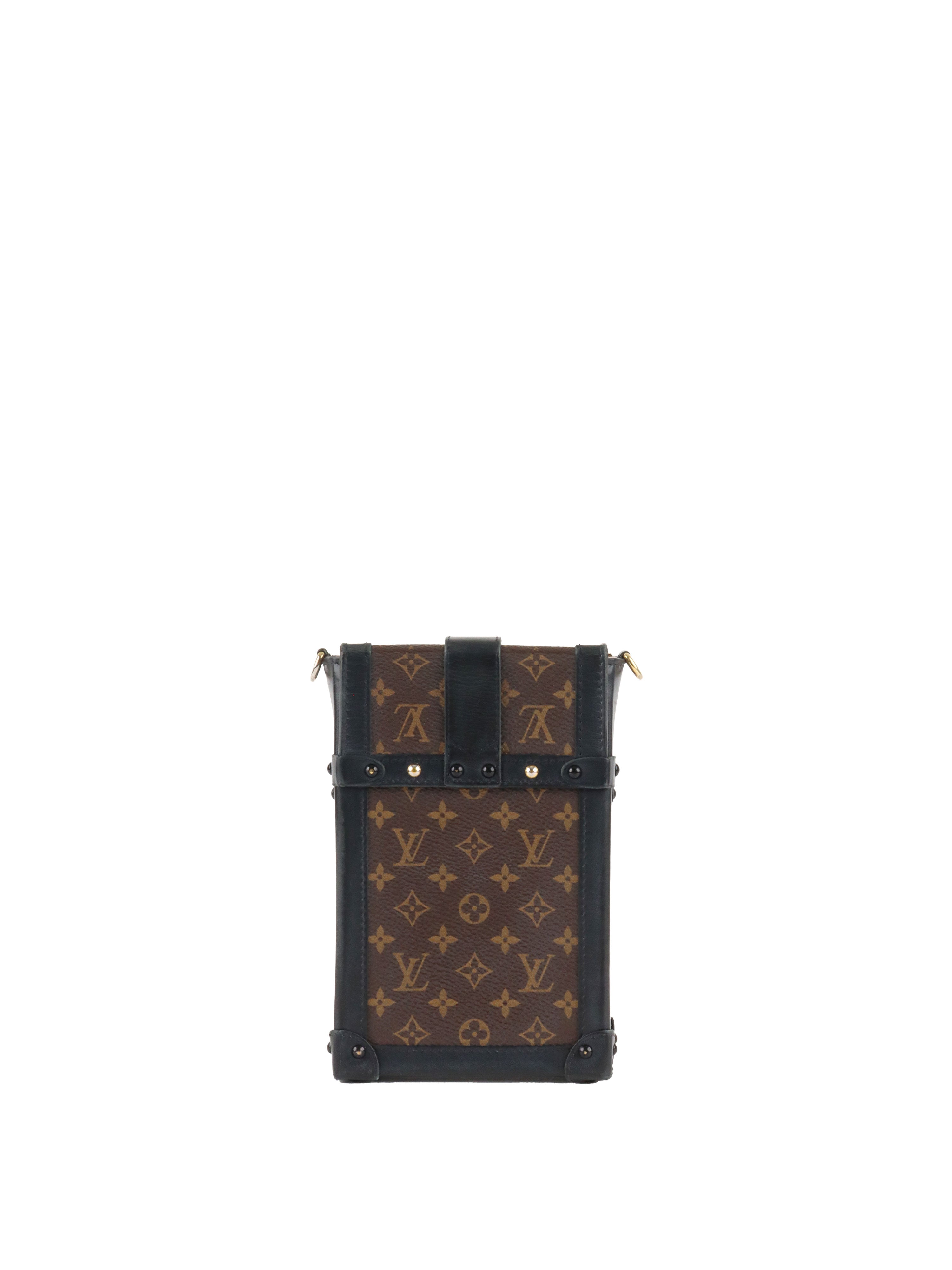 Louis Vuitton monogram Vertical Trunk Pochette.