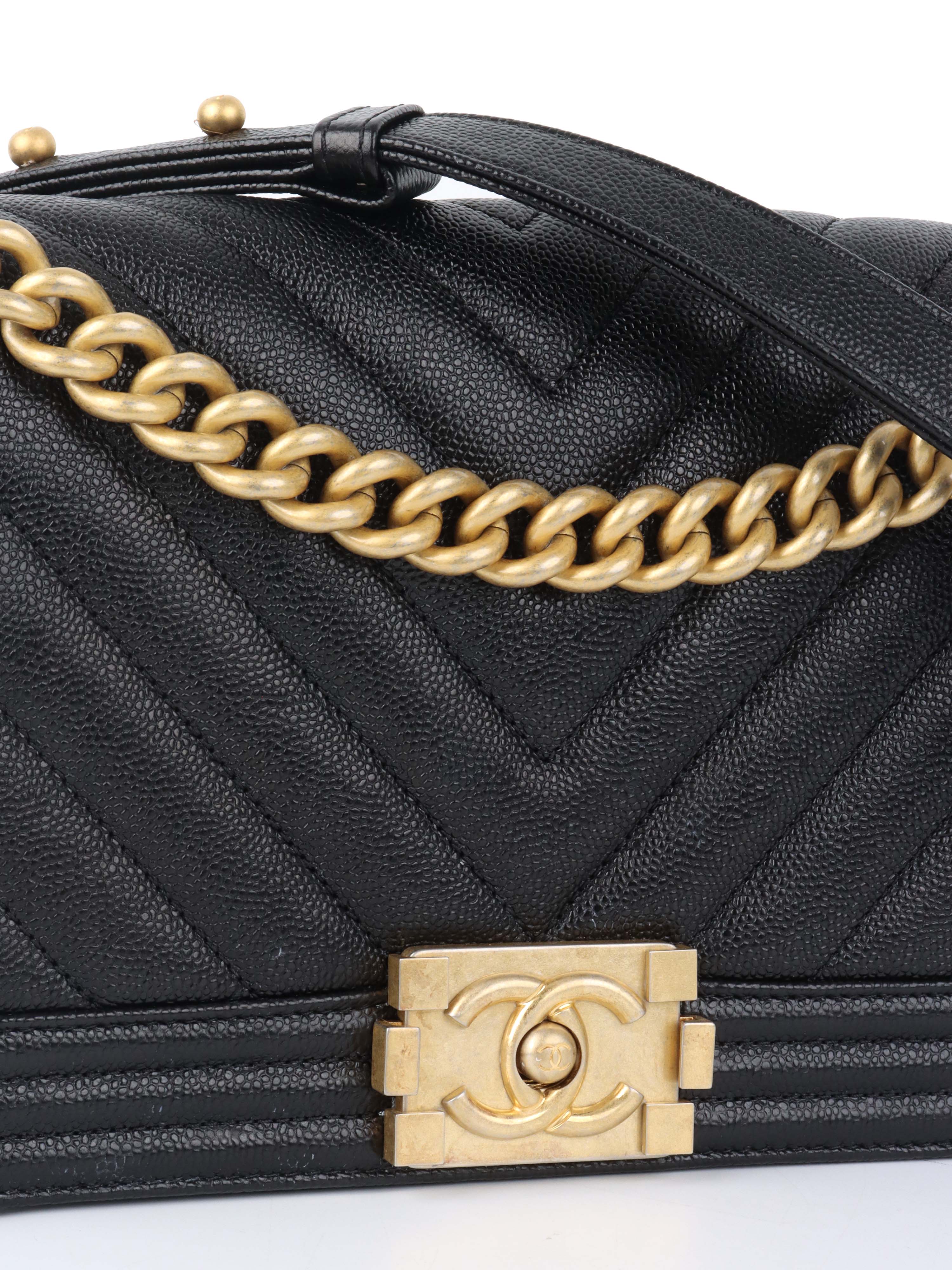 Chanel Black Chevron Caviar Medium Boy Bag.