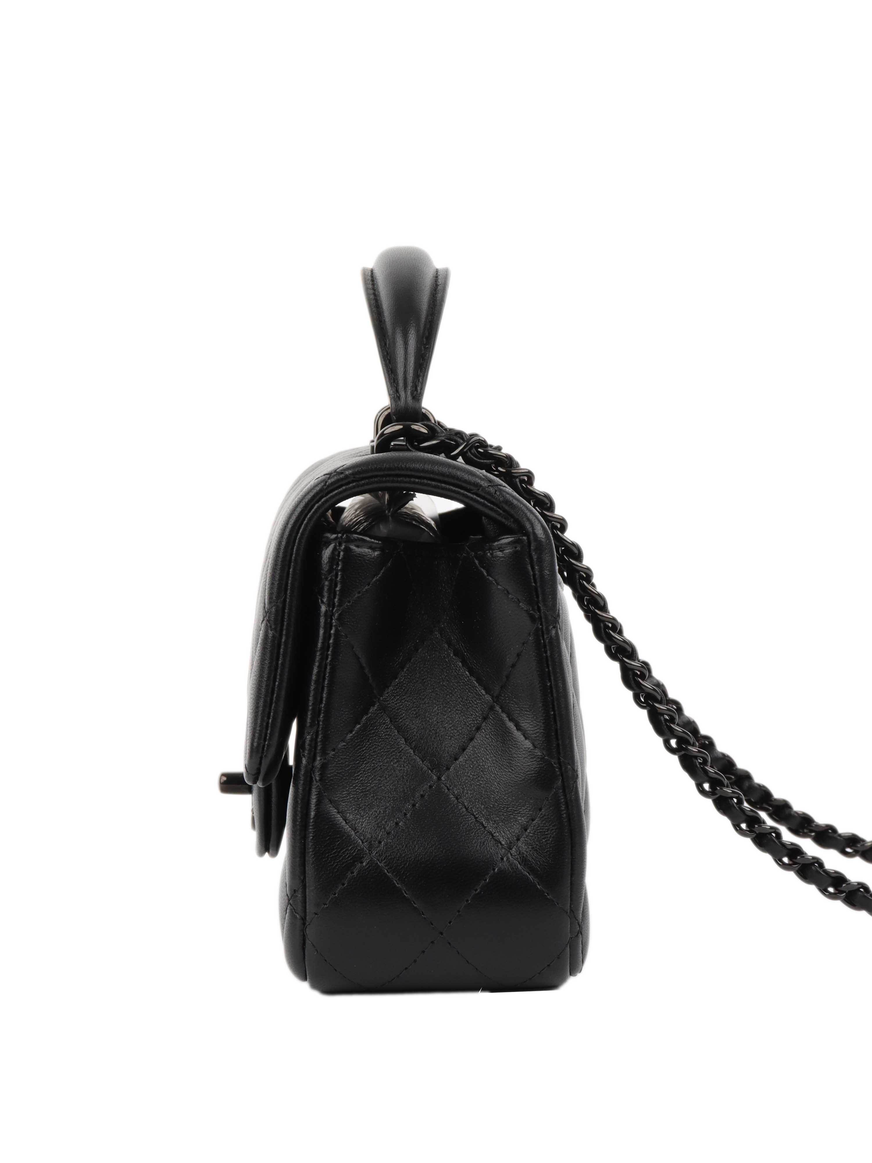 Chanel All Black Rectangular Classic Flap with Handle.