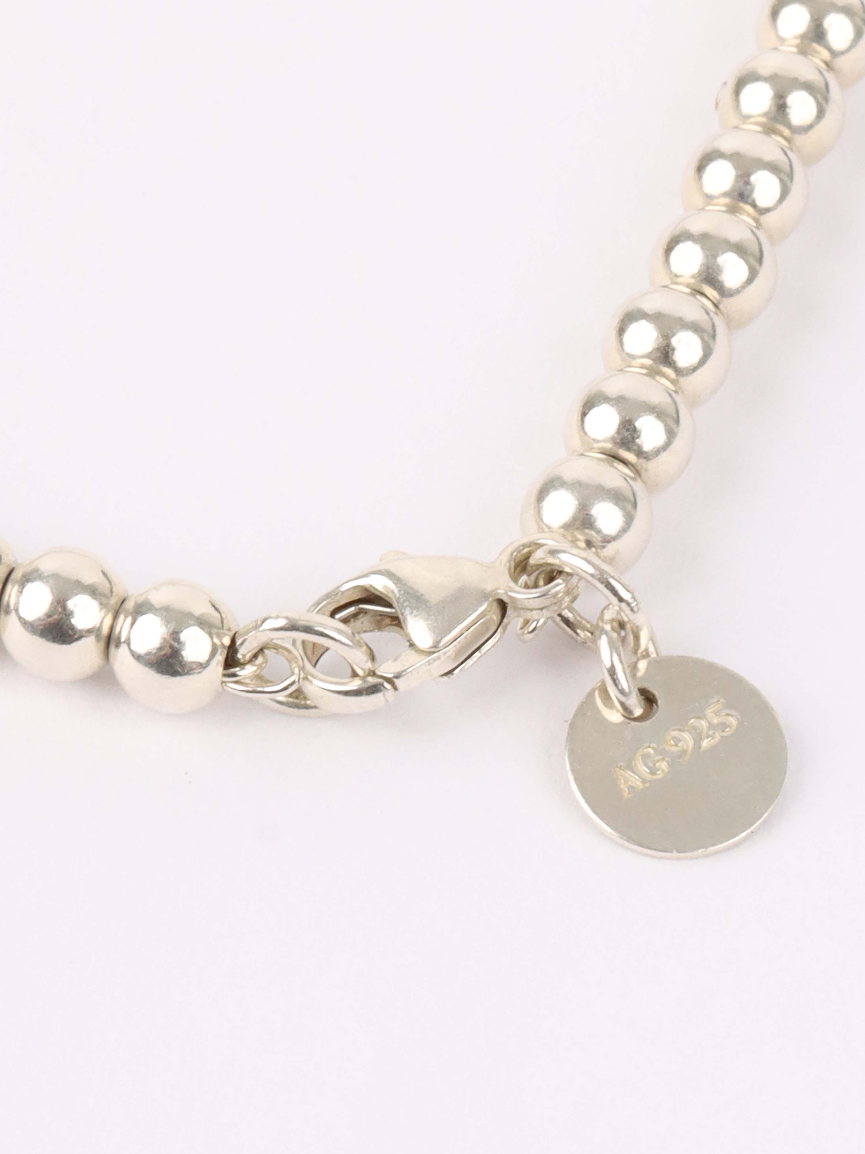 Tiffany & Co Pink Mini Heart Bead Bracelet.