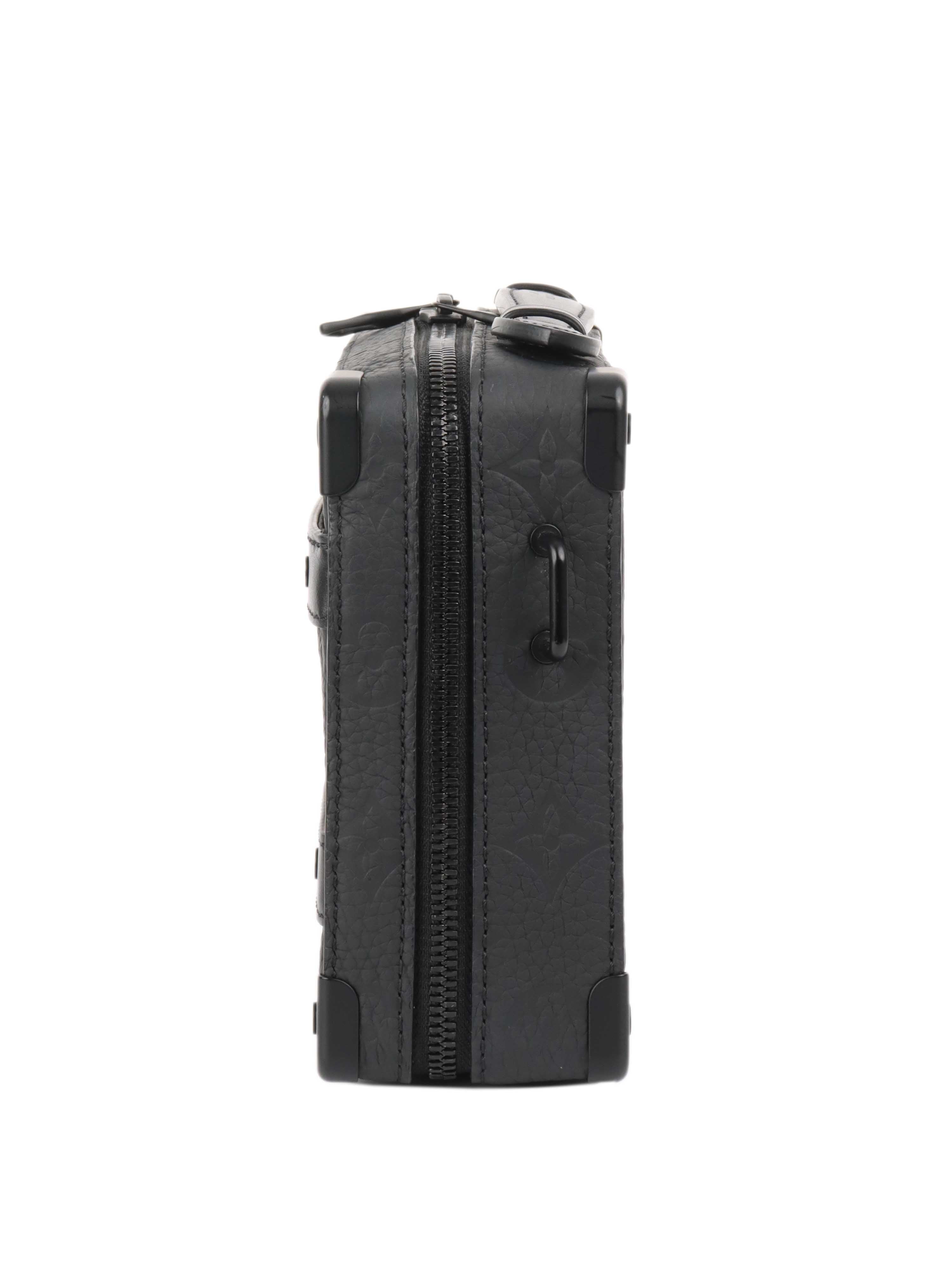 Louis Vuitton Black Handle Soft Trunk.