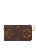 Louis Vuitton Monogram Trio Pouch.