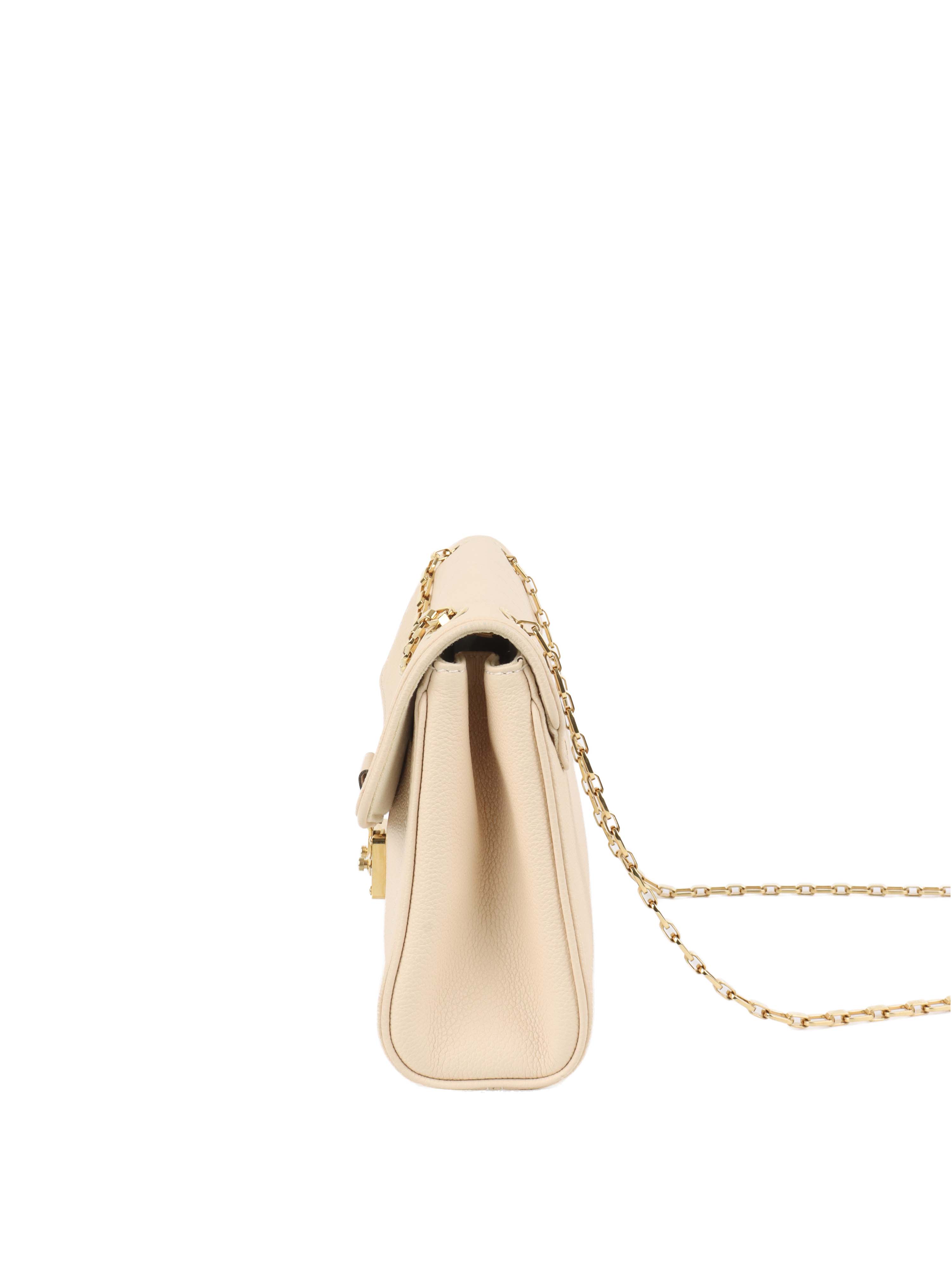 Louis Vuitton Cream Monogram Empreinte Saint Germain PM Bag.