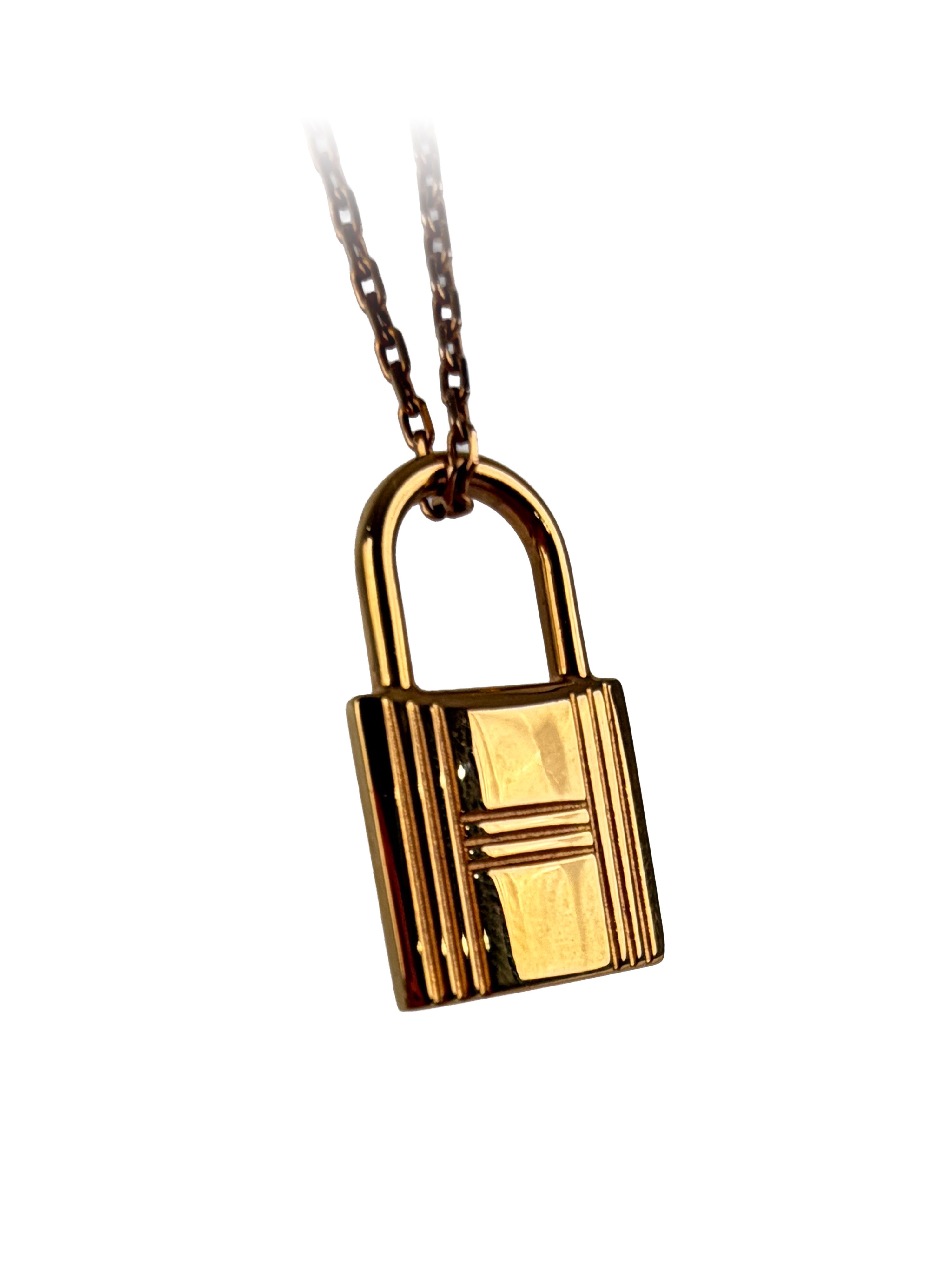 Hermes Black & Gold O'Kelly Pendant.
