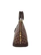 Louis Vuitton Damier Ebene Alma PM.