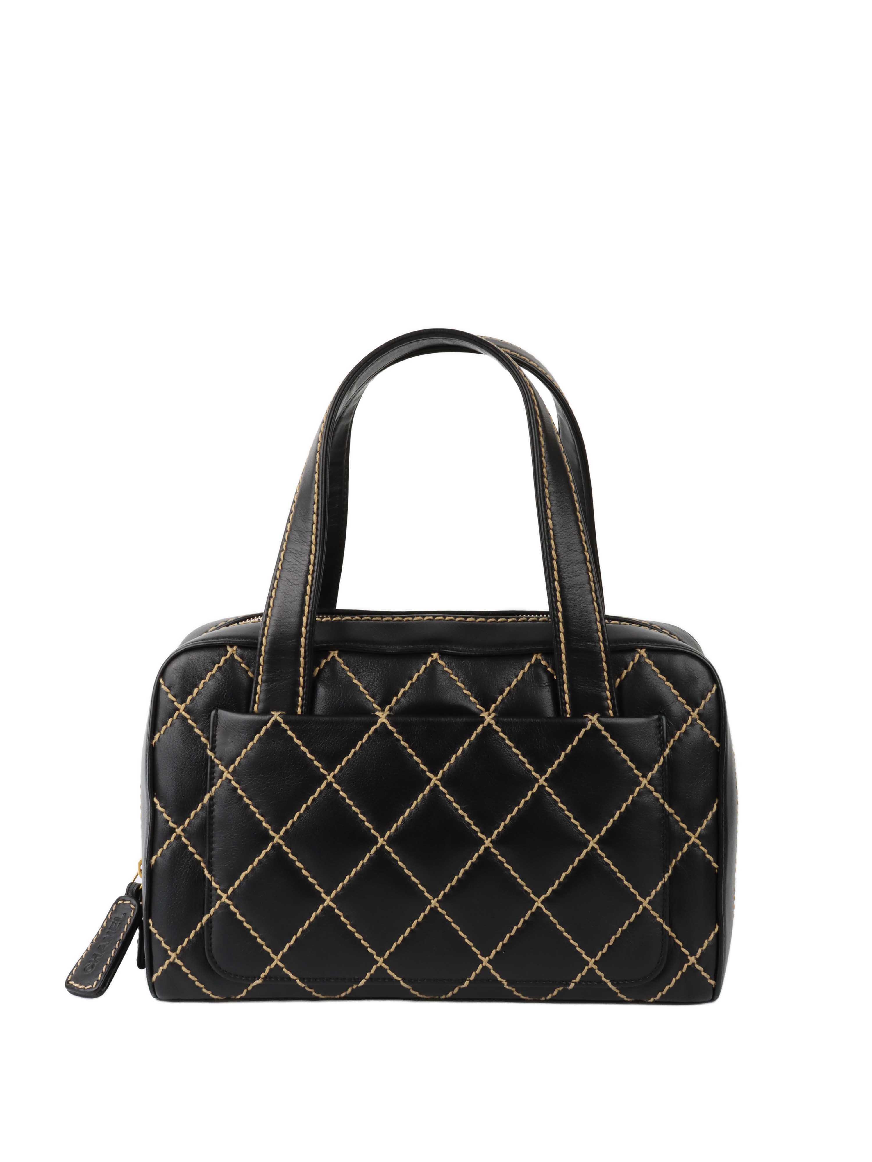 Chanel Black with Gold Trim Bowling Bag.