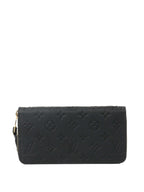 Louis Vuitton Black Monogram Empreinte Leather Clemence Wallet.
