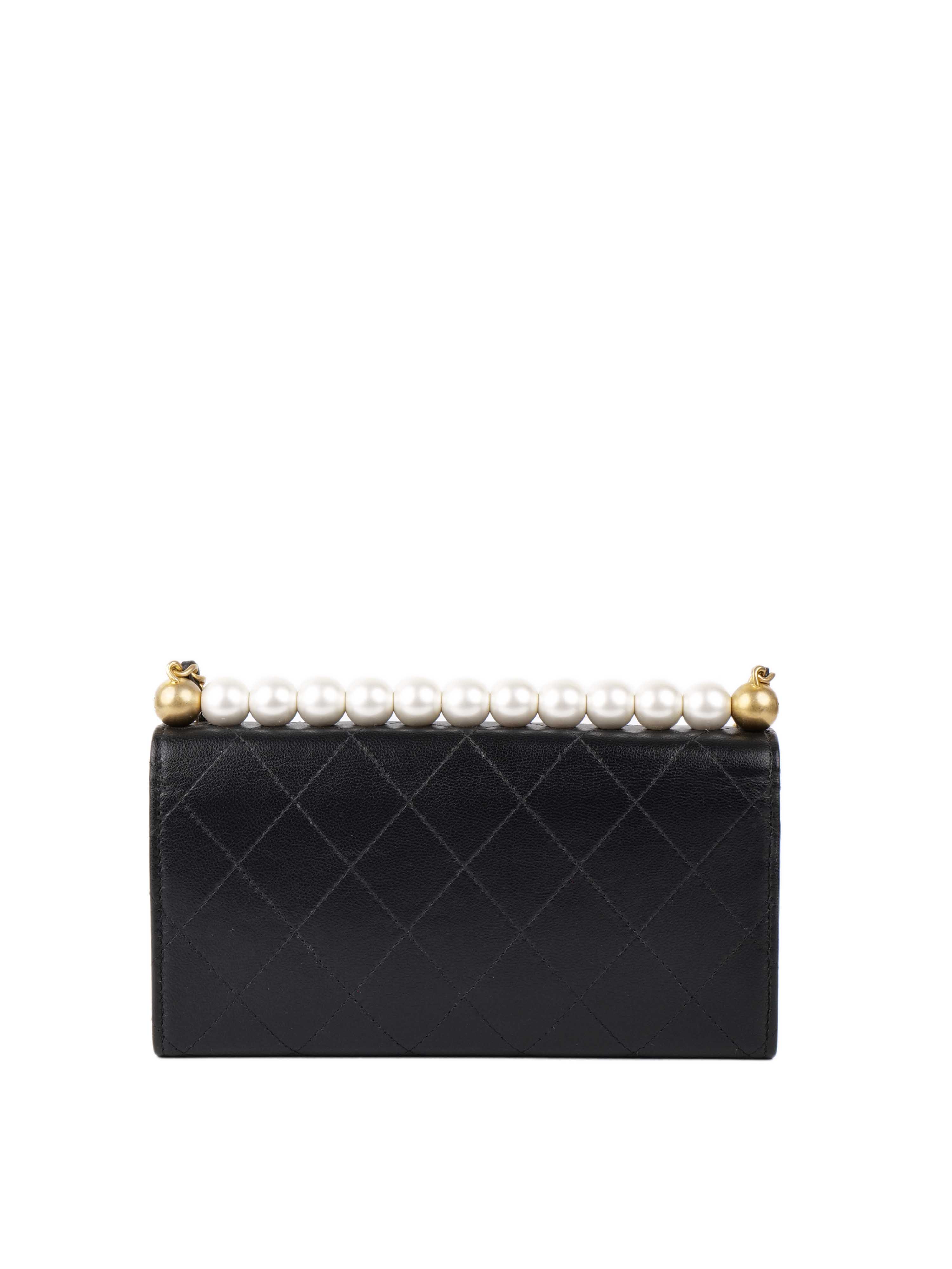 Chanel Black Wallet on Chain with Pearl Edge.