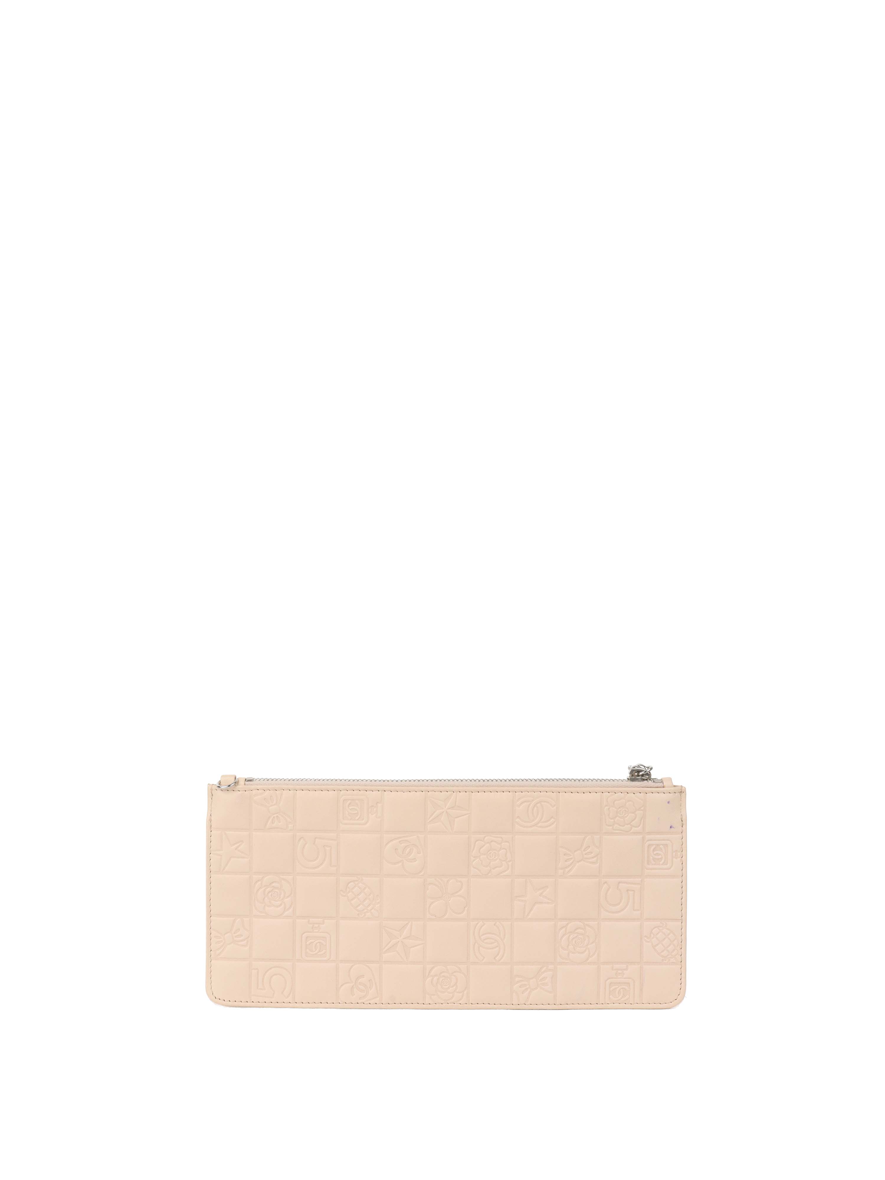 Chanel Beige Lucky Embossed Symbols Pochette with Wristlet Chain.