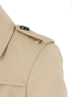 Burberry Tan Trench Coat with Leather Sleeve Straps.