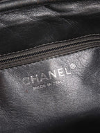 Chanel Metallic Silver 2.55 Reissue Camera Bag.
