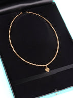 Tiffany & Co Yellow Gold Mini Heart Tag Bead Necklace