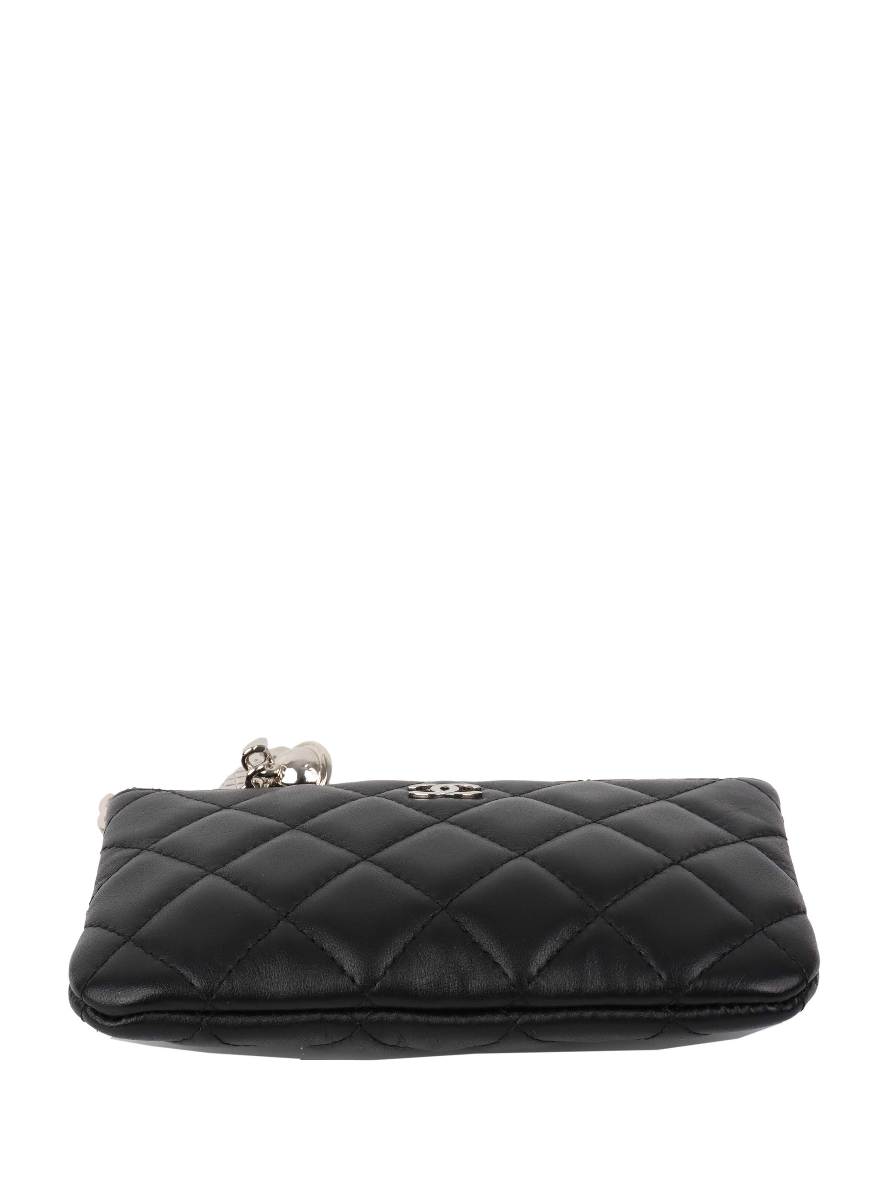 Chanel Black Lambskin Zip Pouch.