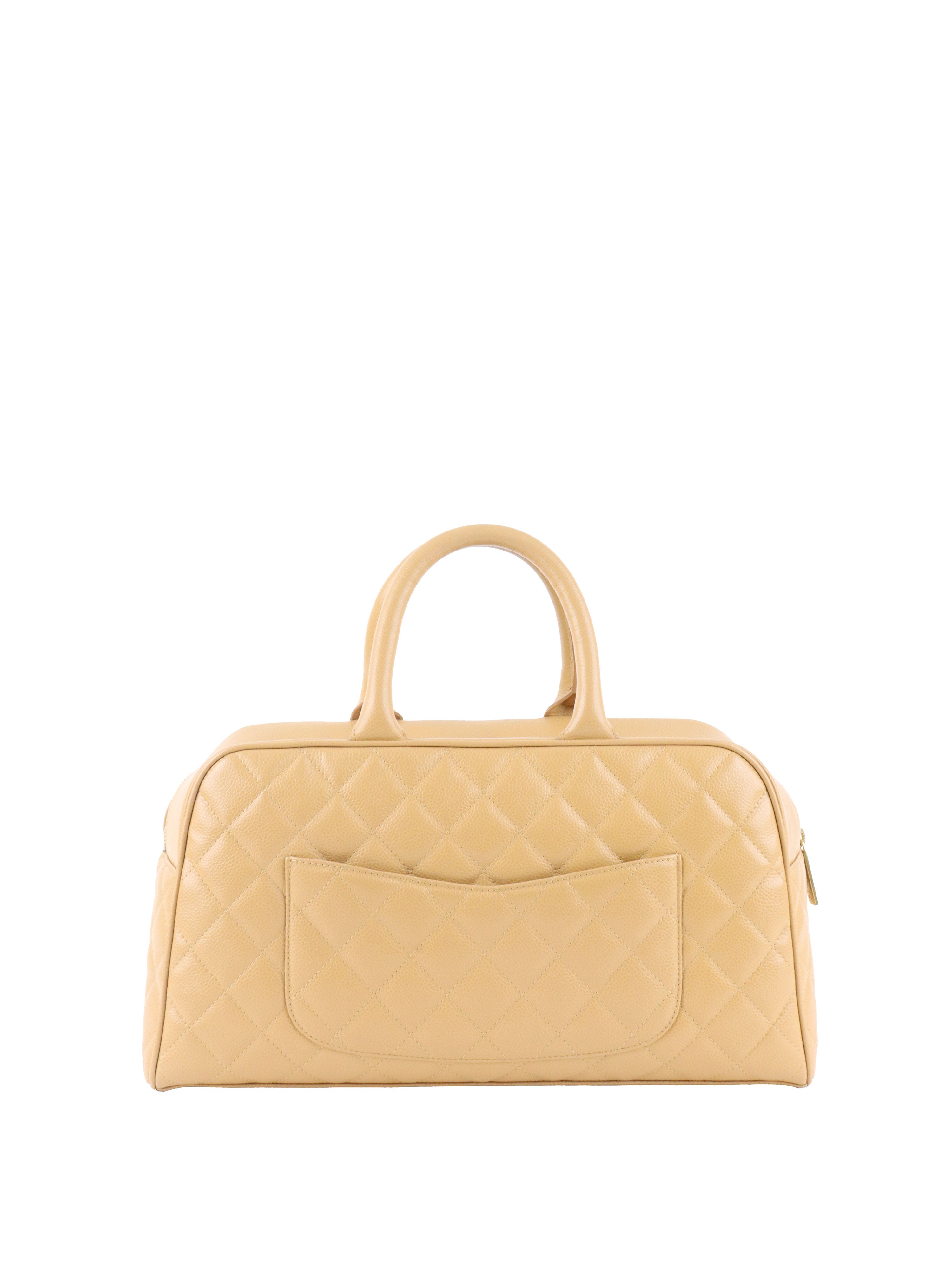 Chanel Beige Caviar Bowling Bag.