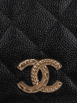 Chanel Black Caviar Small Flap Wallet.