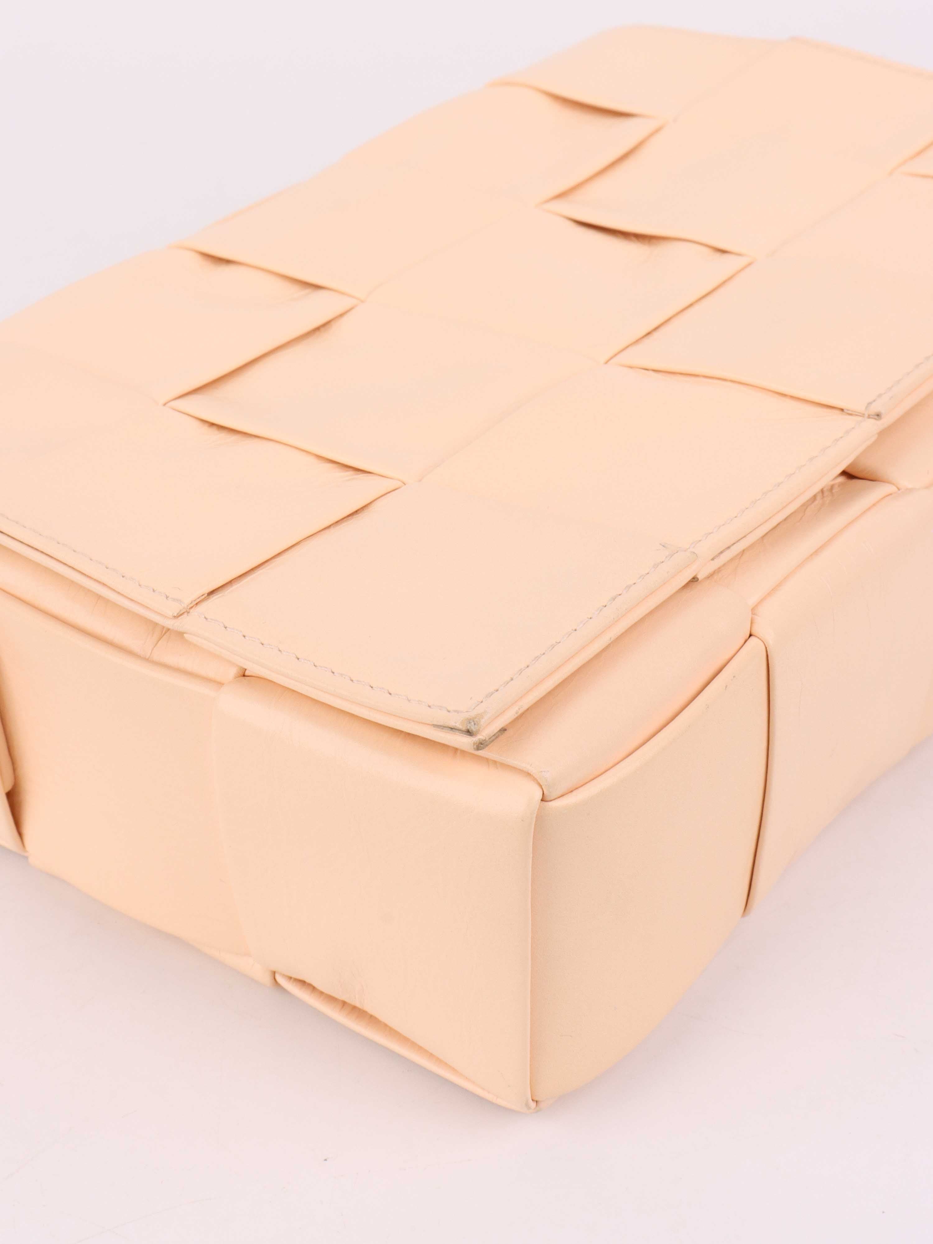 Bottega Veneta Light Peach Cassette Bag.