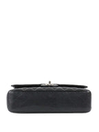 Chanel Medium Black Caviar Classic Flap.
