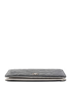 Chanel Black Camellia Wallet.