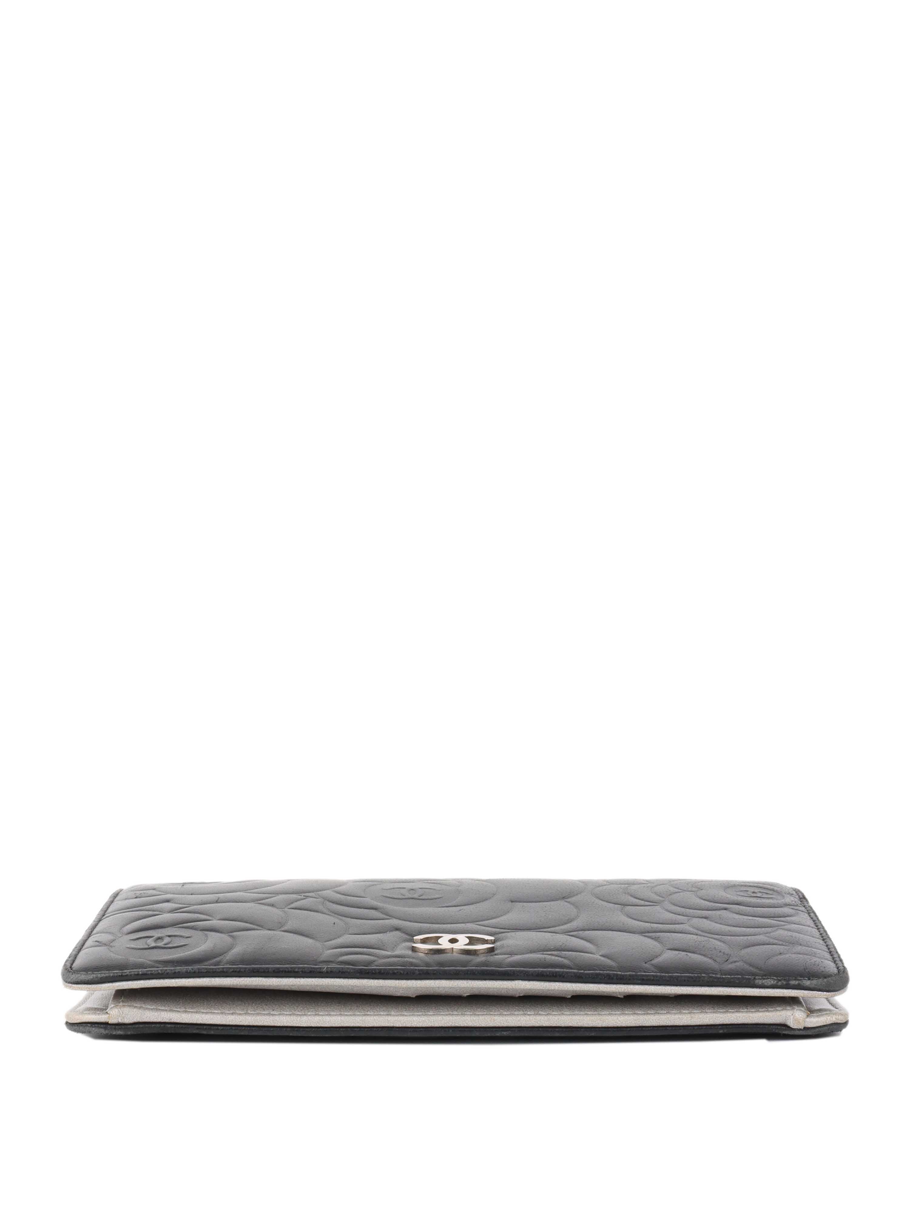 Chanel Black Camellia Wallet.
