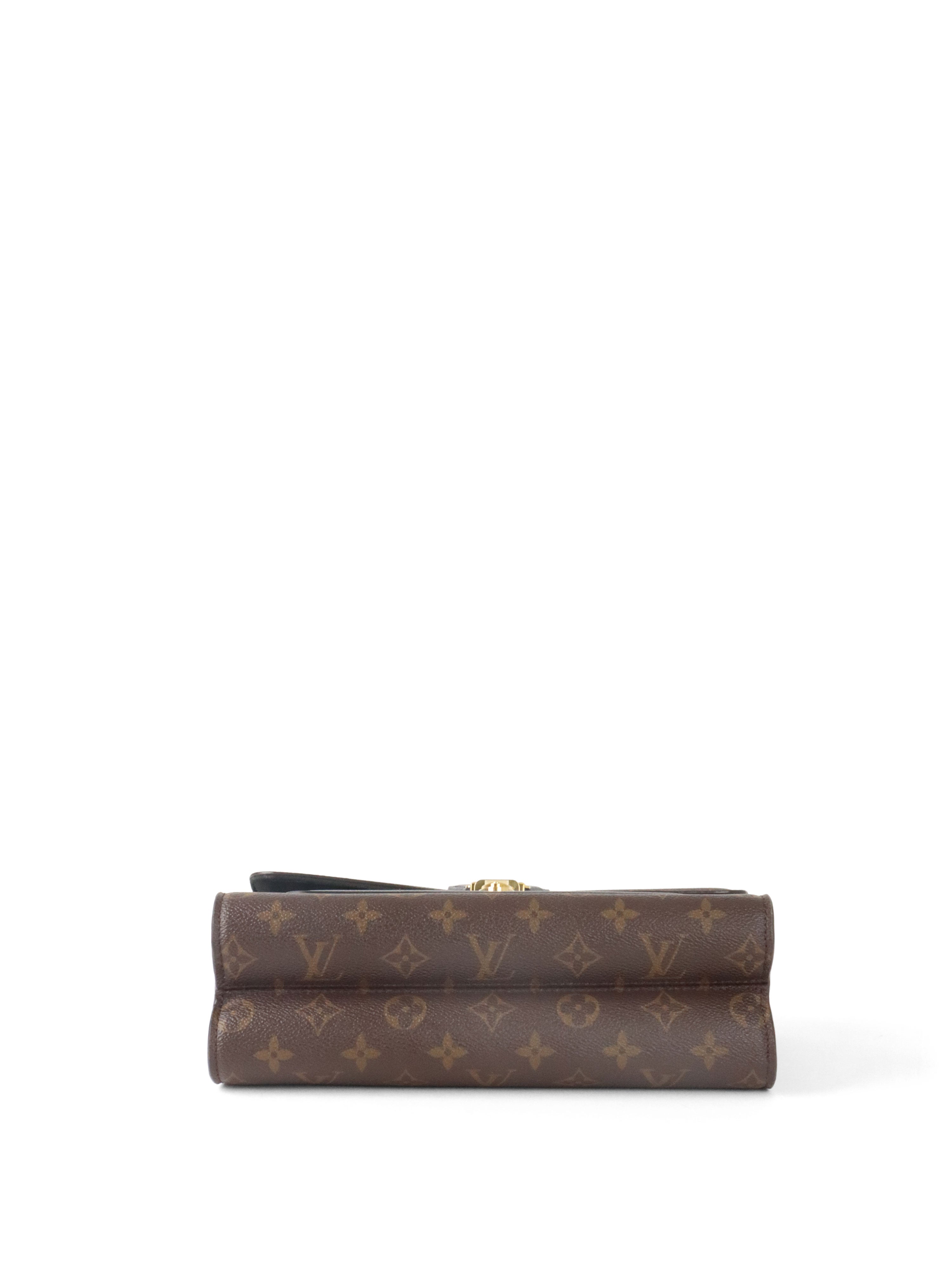 Louis Vuitton Black Victoire MNG MM Bag.