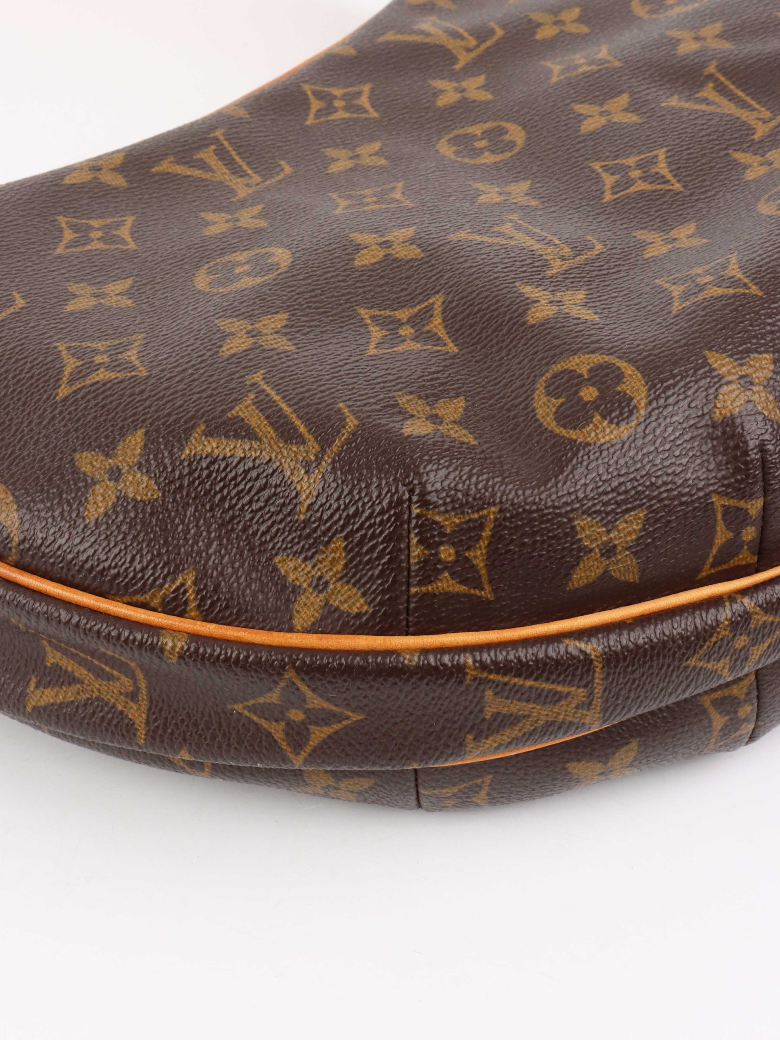 Louis Vuitton Vintage Croissant Bag.