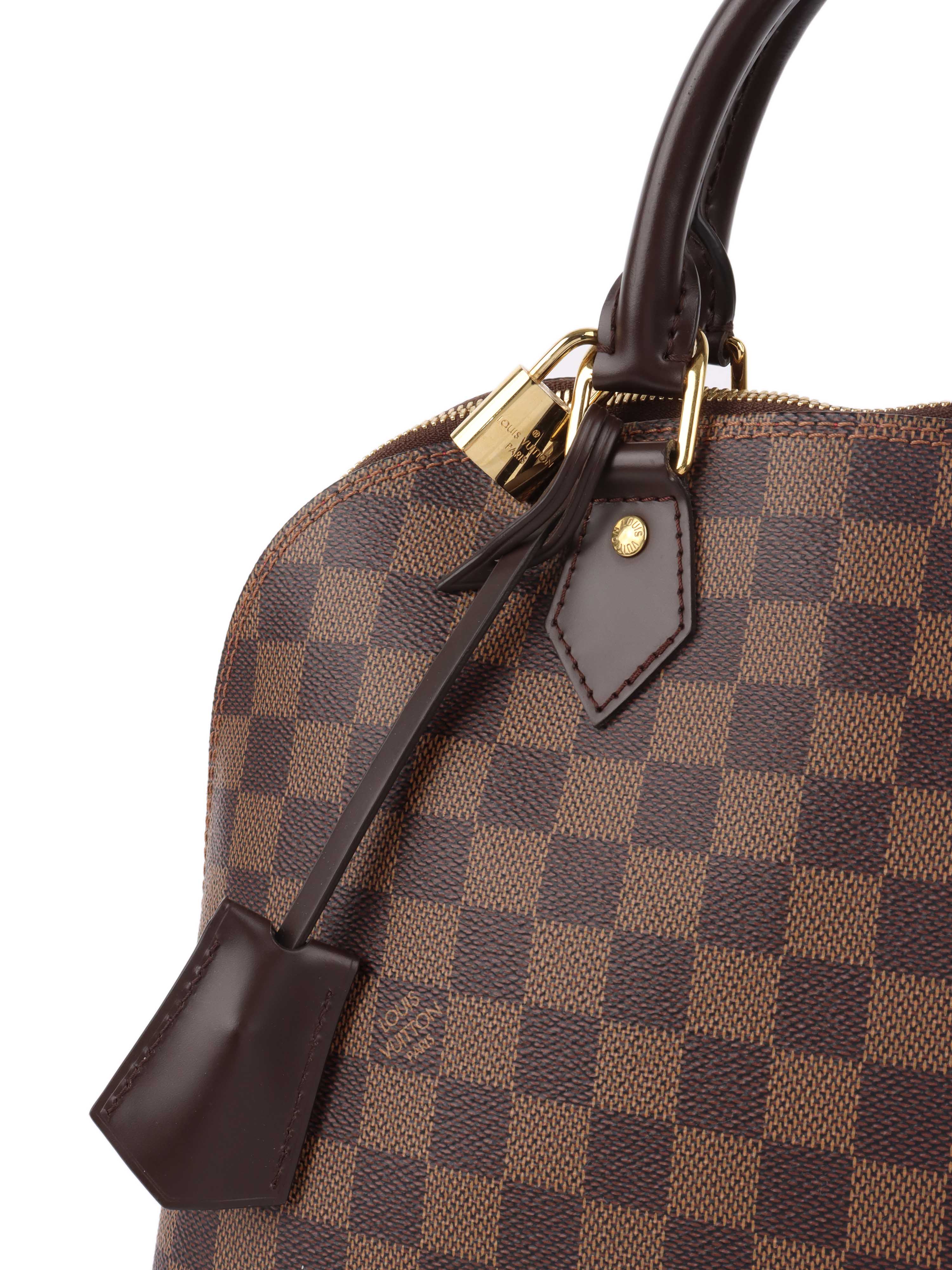 Louis Vuitton Damier Ebene Alma PM.