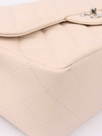 Chanel Jumbo Ivory Caviar Classic Flap.