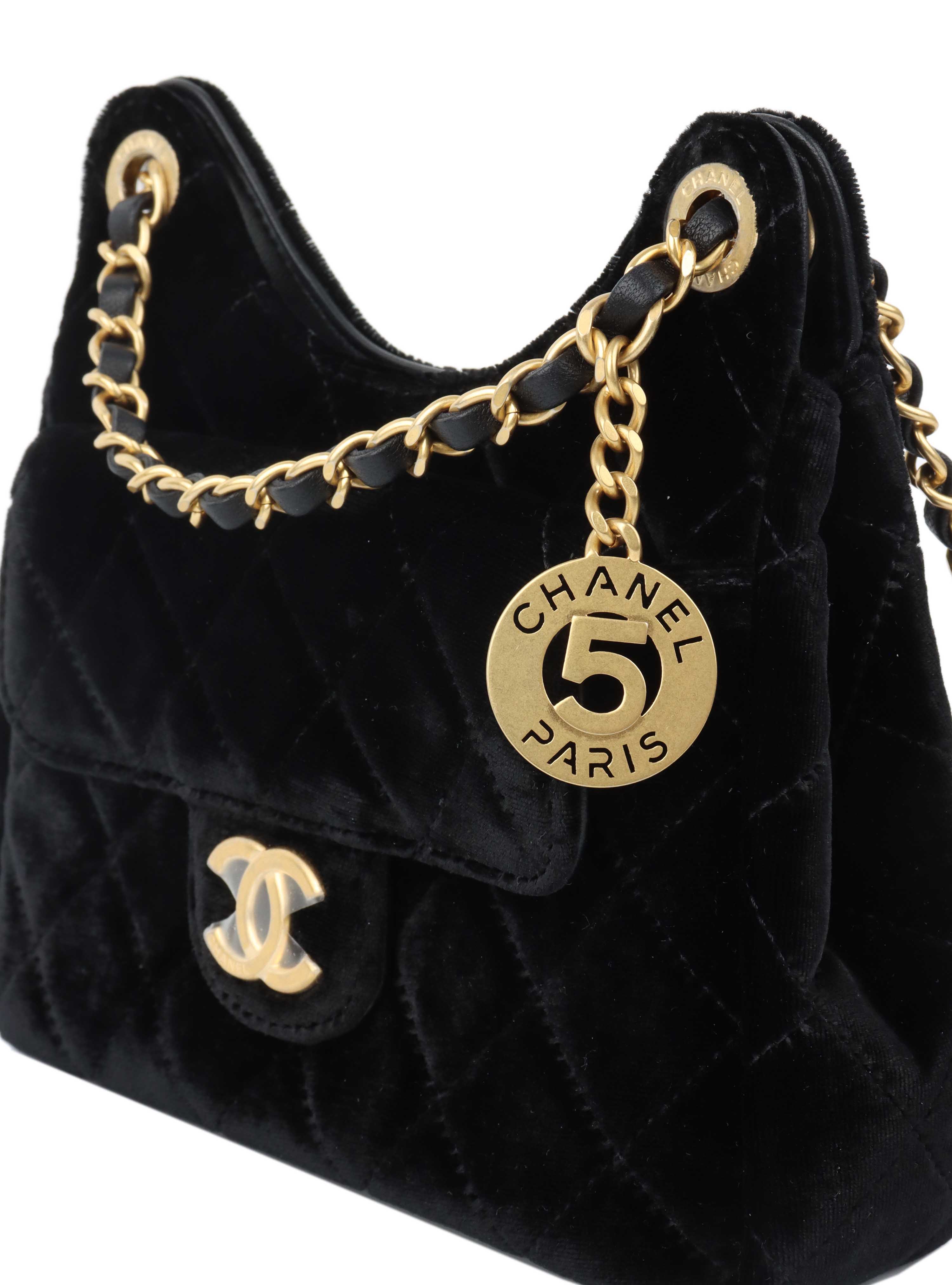 Chanel Black Small Quilted Velvet Wavy CC Hobo Bag.