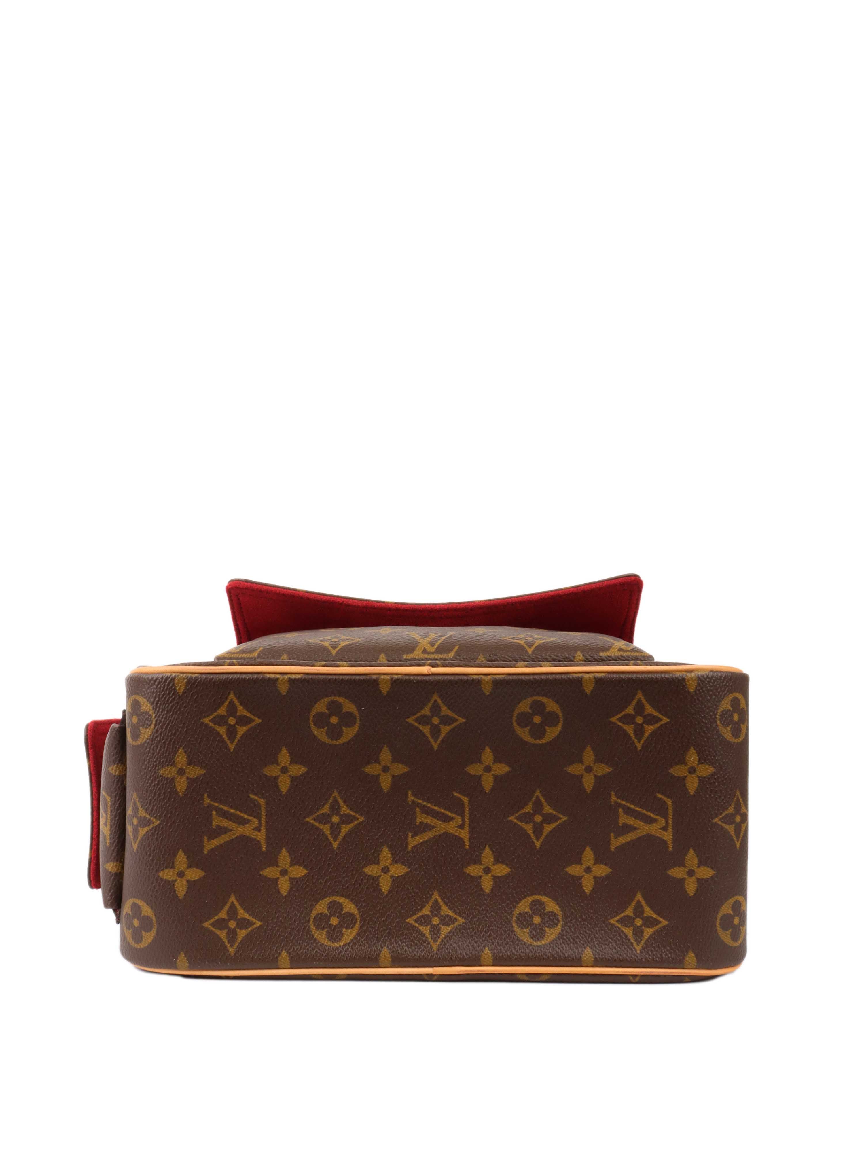 Louis Vuitton Monogram Excentri-Cite Handbag.