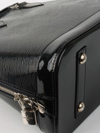 Louis Vuitton Epi Leather Alma PM bag.
