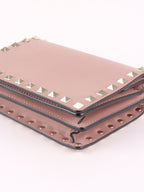 Valentino Garavani Pink Rockstud Cross Body Bag.