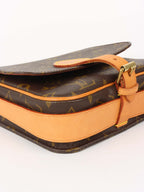 Louis Vuitton Monogram Cartouchiere PM Bag.
