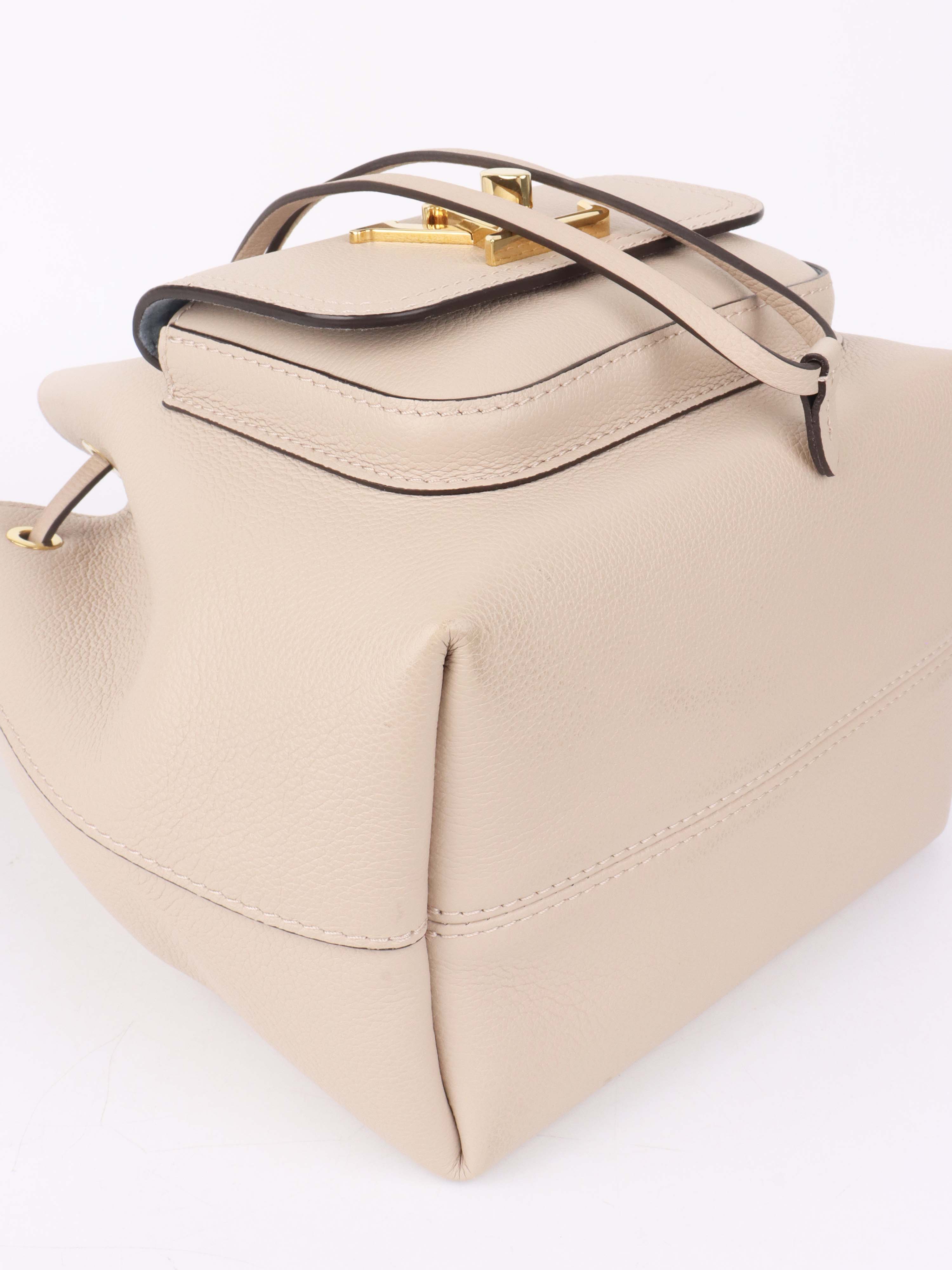 Louis Vuitton Beige Lockme Bucket Bag.