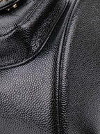 Chanel Black Caviar Duma Backpack.