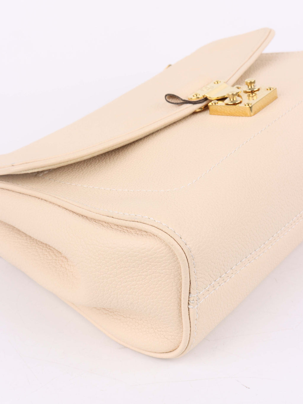 Louis Vuitton Cream Monogram Empreinte Saint Germain PM Bag.