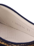 Chanel Navy Sneakers.