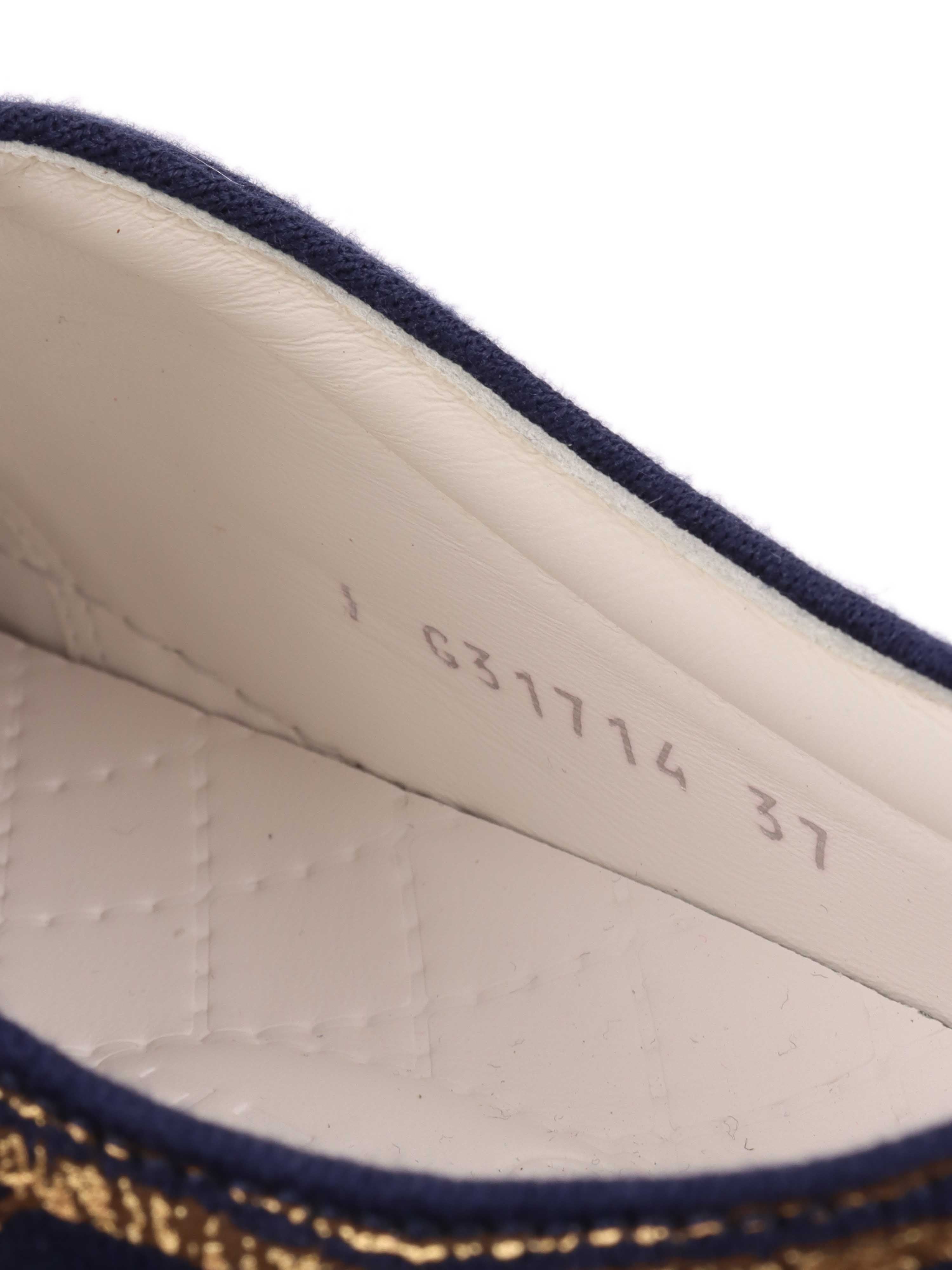 Chanel Navy Sneakers.
