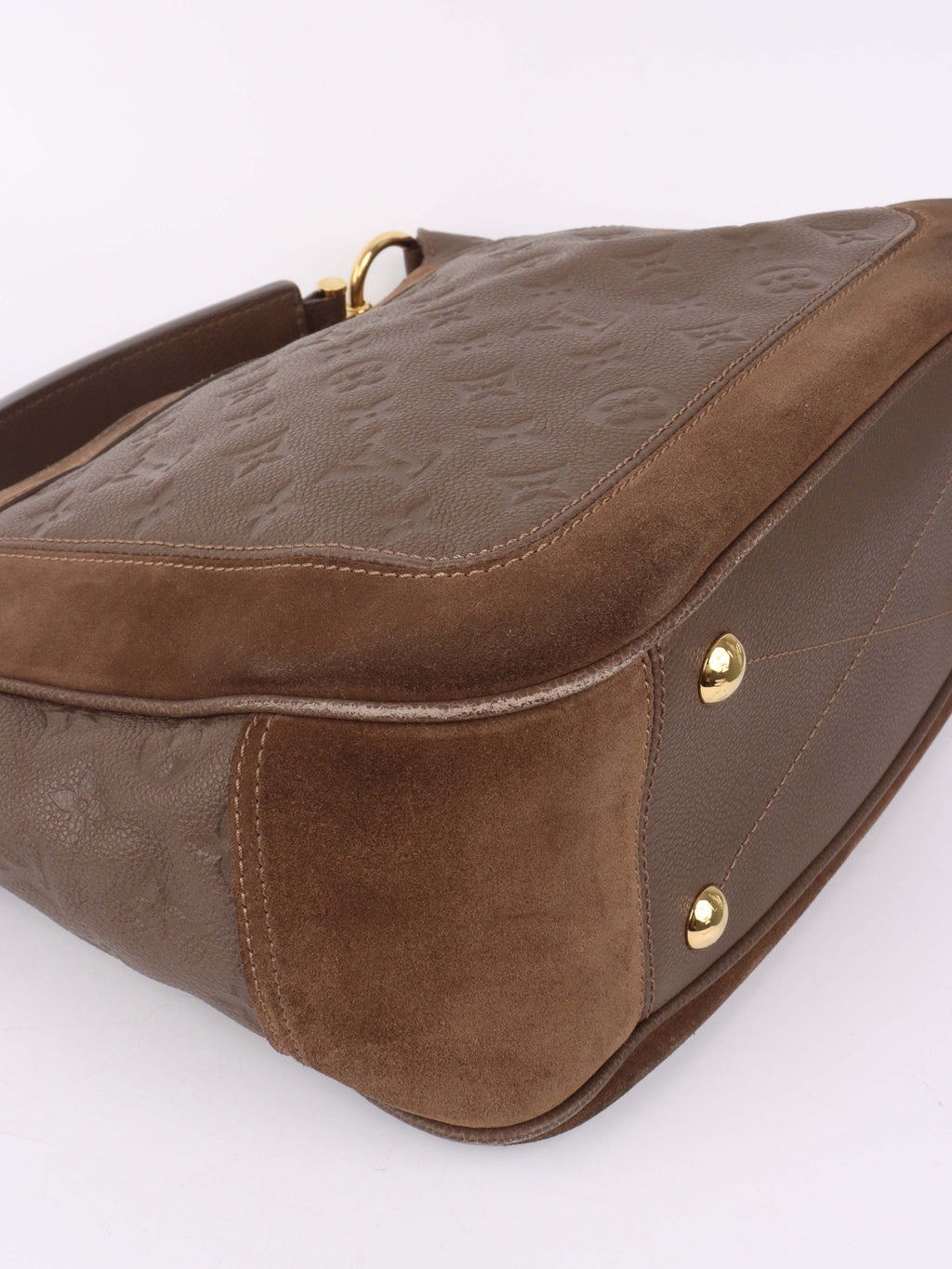 Louis Vuitton Terre Empreinte Monogram Audacieuse PM Bag.