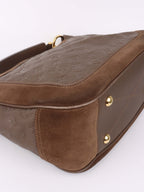Louis Vuitton Terre Empreinte Monogram Audacieuse PM Bag.