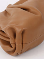 Bottega Veneta Mini Pouch in Tan.