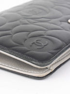 Chanel Black Camellia Wallet.