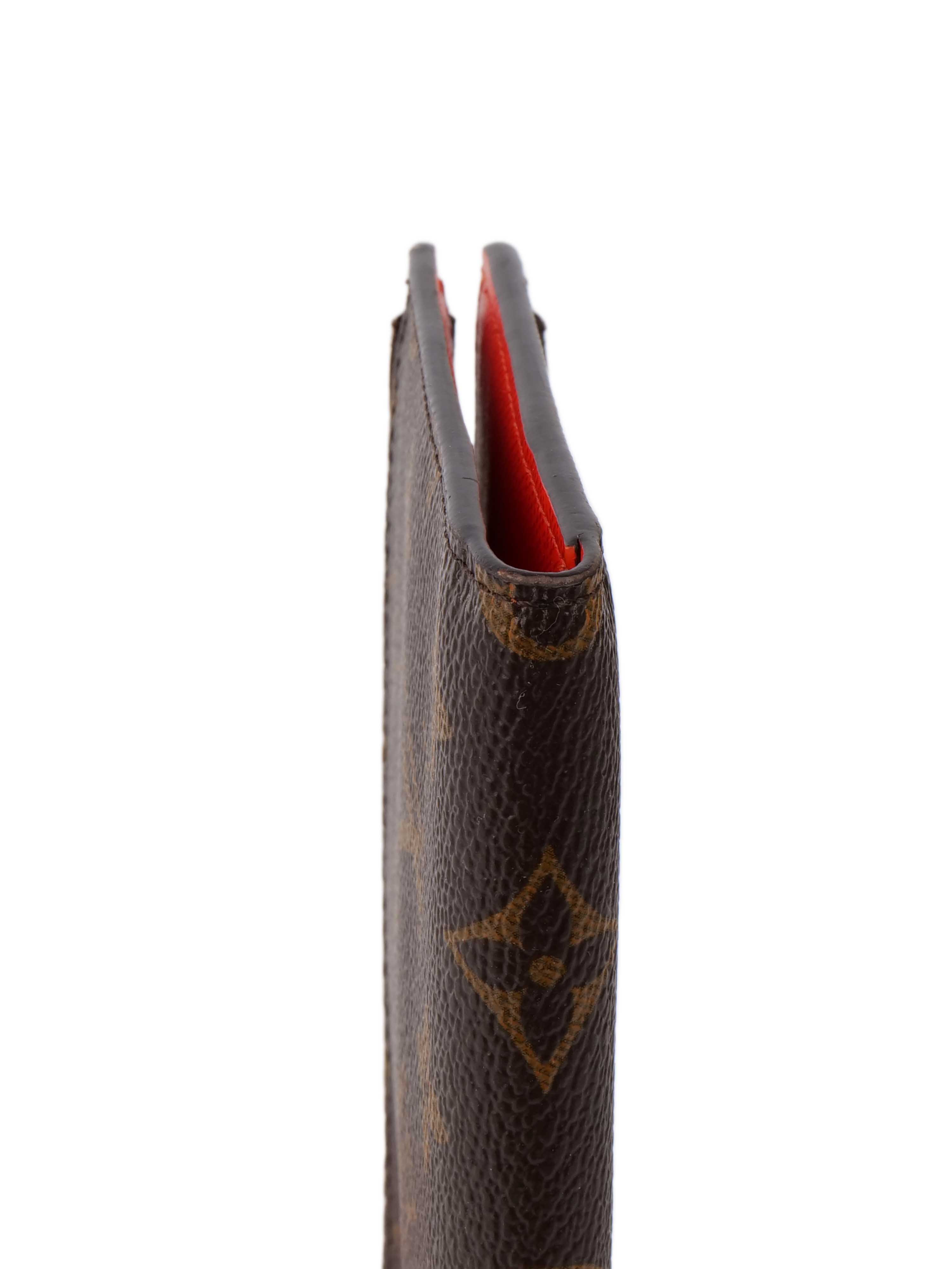 Louis Vuitton Monogram Double Zipped Wallet.