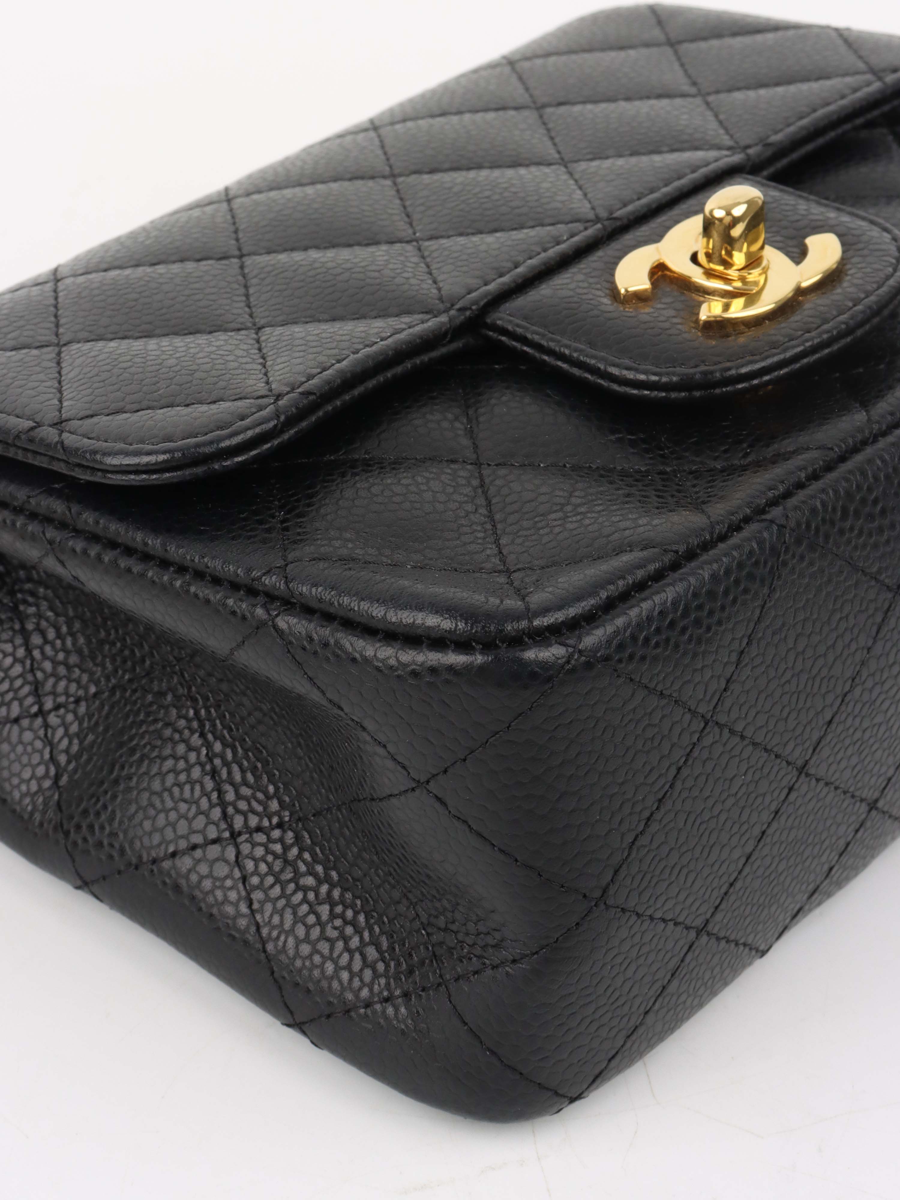 Chanel Black Mini Caviar Square Flap Bag.