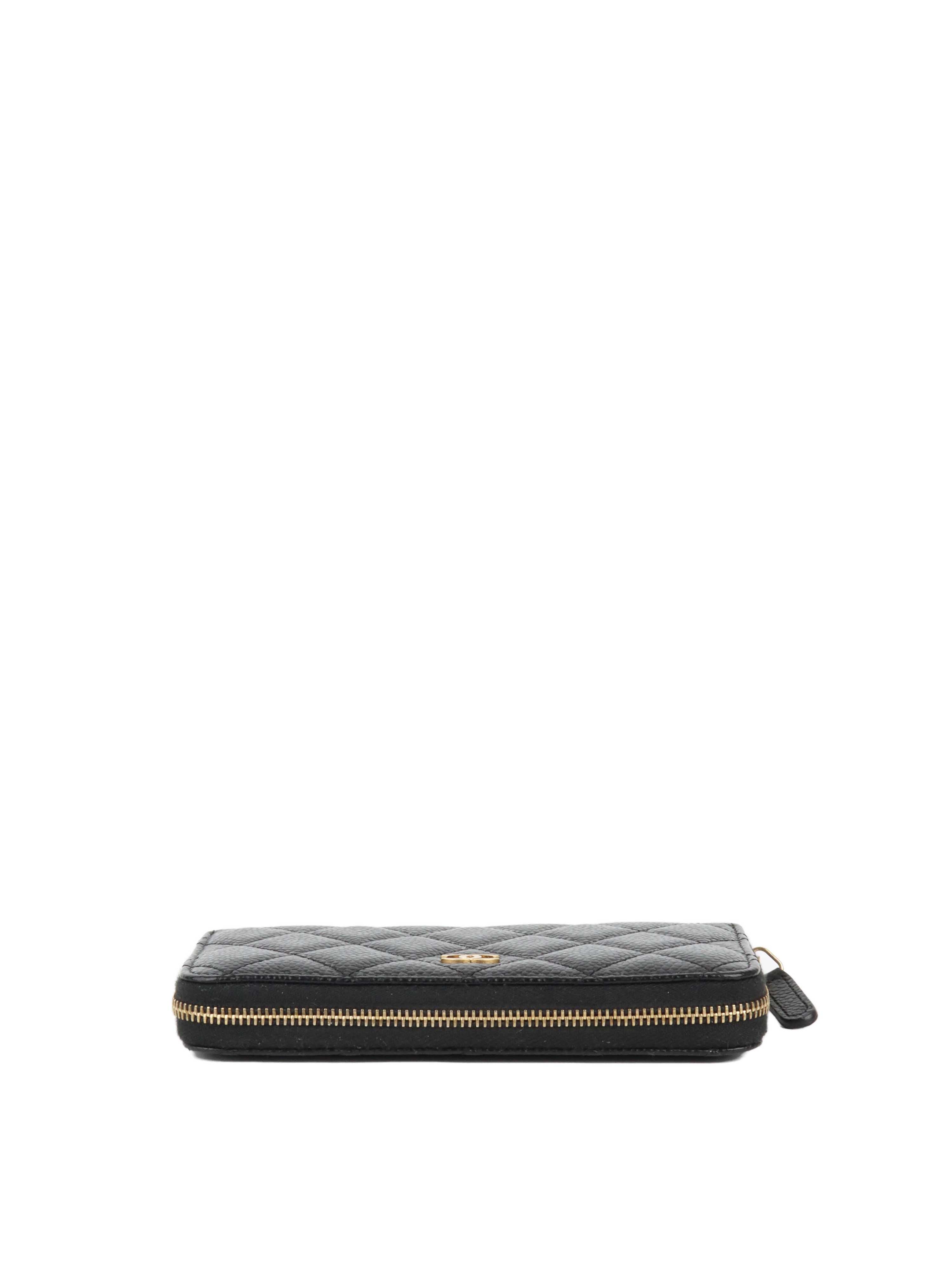 Chanel Zip Around Black Caviar Wallet.